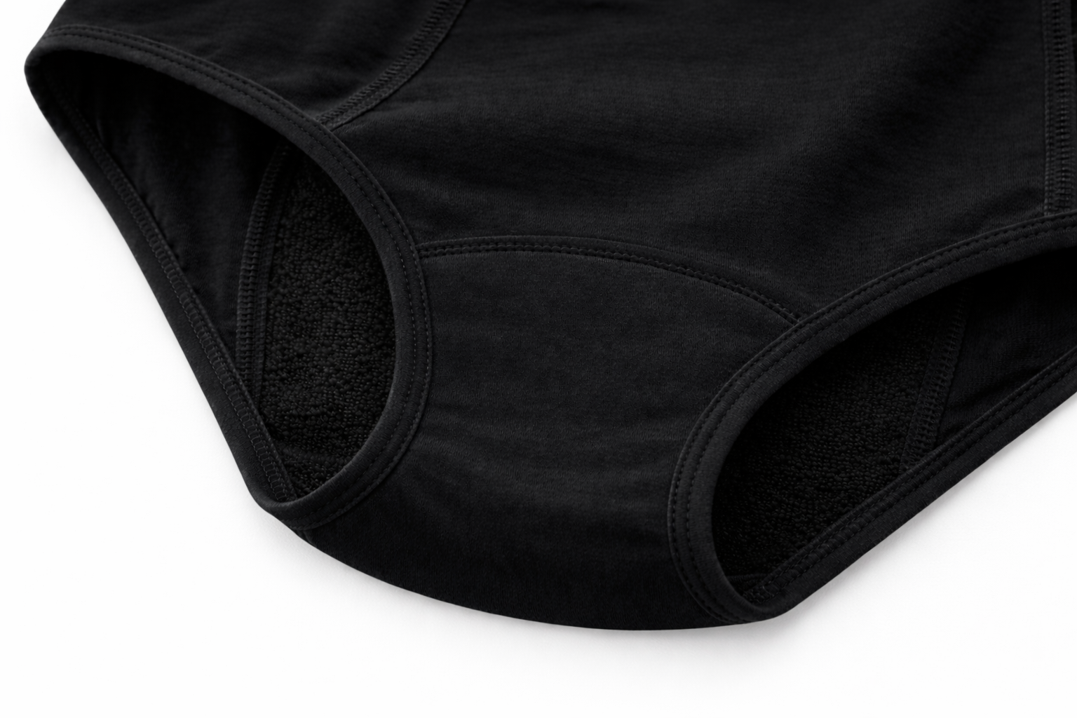 ComfortCure Adaptiver auslaufsicherer Damenslip, Schwarz, Detailansicht der inneren saugfähigen Einlage